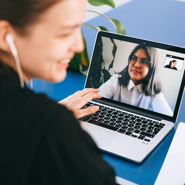 People in a video conference on a computer.
