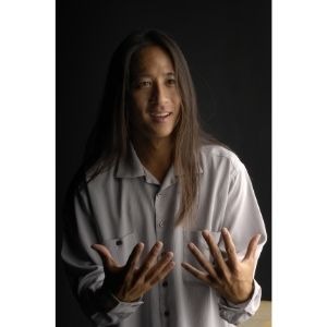 Kealoha, with hands turned upwards.