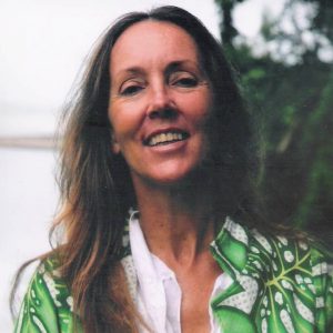 Lasensua Osborne, smiling and looking at the camera.